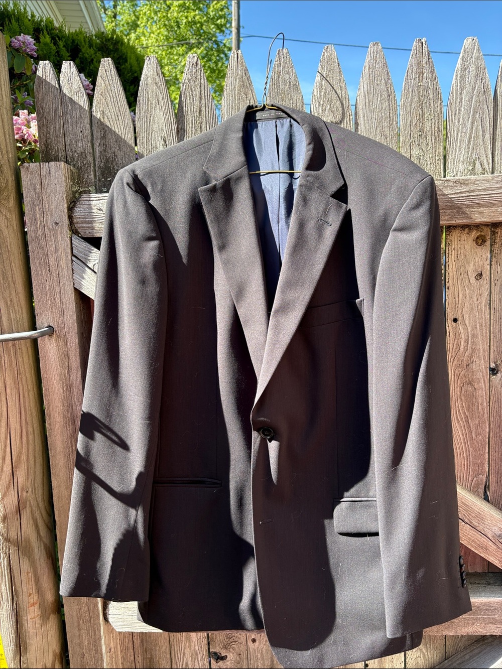 Hugo Boss 42R black virgin wool blazer.